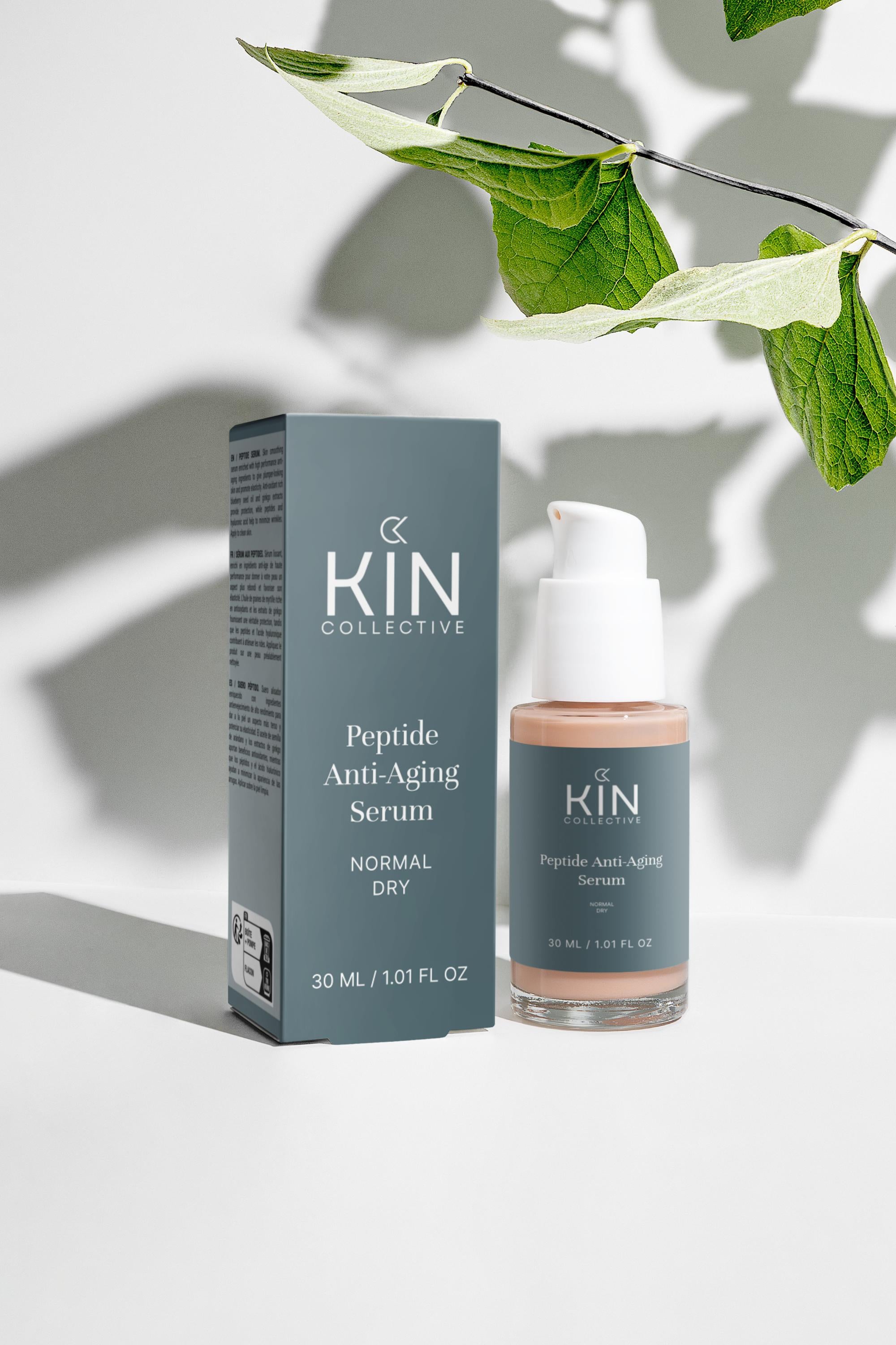 Peptide anti-aging serum for normal to dry skin with product box, natural leaf accent